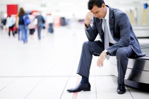 worried businessman lost his luggage at airport